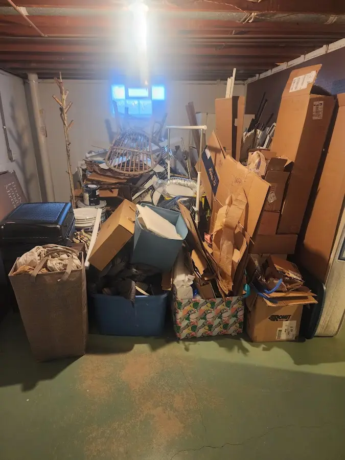 Roll-off dumpster container at job site for 2 Yard Dumpster Rental in Spring Valley Lake